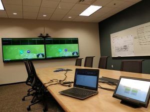 green televisions with laptops